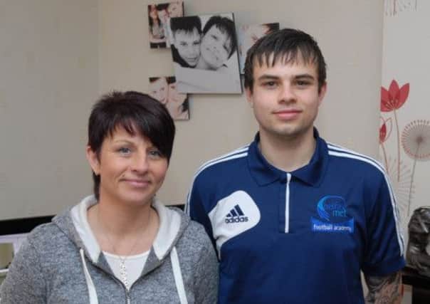 Alison Barry with her son Lee Barry who has Von HippelLindau (VHL) disease. They have organised various fundraising events for the cancer charity including an all day pool competition to be held in the St Comgall's Club on 30th March. INLT 10-382-PR