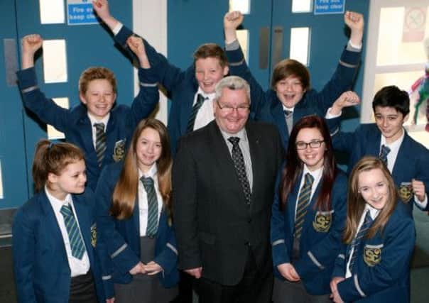 Slemish College pupils celebrate with Dr. Paul McHugh who has been nominated for the "Principal of the Year.". INBT11-215AC