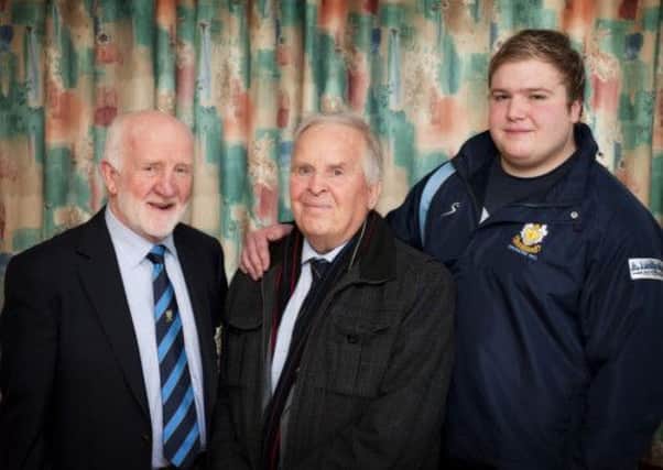 Dromore Rugby Club Chaplain, Rev Sam Peden was the sponsor of the club's Kukri Qualifying League game against CIYMS at Barban Hill. Included is club president, Denis Savage and Sam's grandson, Adam McDonald who plays for the 1st XV. Photo: drewmcwilliams.com INBL11-600dmcw