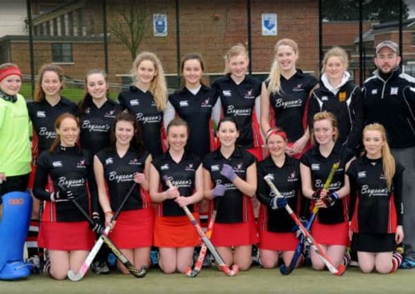 TEAM... The Rainey Ladies Hockey team pictured prior the start of their league clash with the PSNI at Coolnafranky last Saturday afternoon.INMM0713-342SR