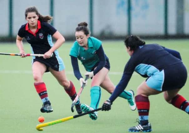 Kerry McIlroy powers her way through the gap in the McConnell Shield game against Belfast Harlequins   INLT 11-417-RM