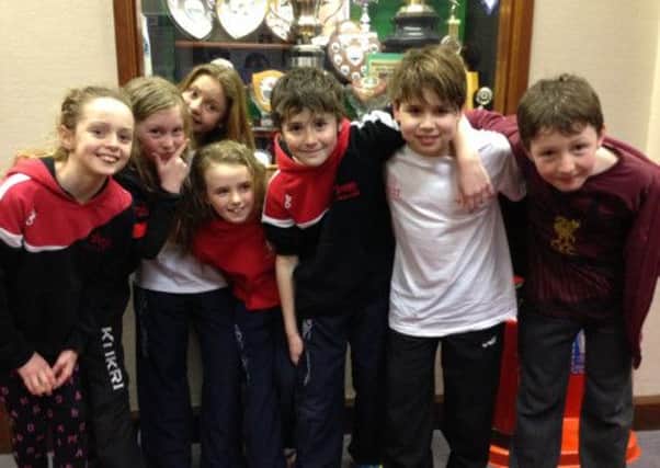 Larne Swimming Club's Age Group B swimmers who competed against Ards. From left to right: Mairead O'Mahoney, Scarlett Armstrong, Monica Del Castillo, Ruby Dougan, Jaime Clements, Oliver Clark, Conor Hamilton. INLT 12-902-CON