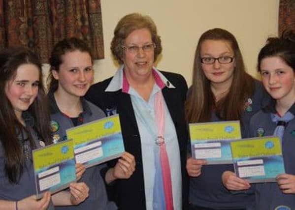 Geraldine Linford pictured with Claire, Katie, Charlotte and Rose who received their Baden-Powell Award
