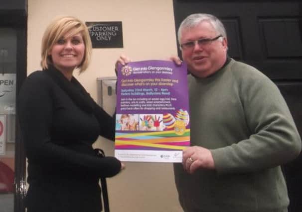 Donna Forte from Eden Coffee shop and Gavin Millar from Ink World launch the Get into Glengormley campaign. A family fun day will take place in the town this Saturday. INNT 12-620con
