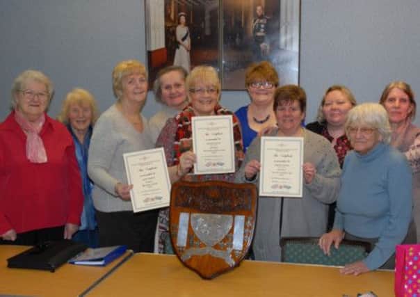 The Royal British Legion, Larne, Women's Section with some of the awards they picked up at the Northern Ireland Conference on 2nd Feb 2013. INLT 08-320-PR