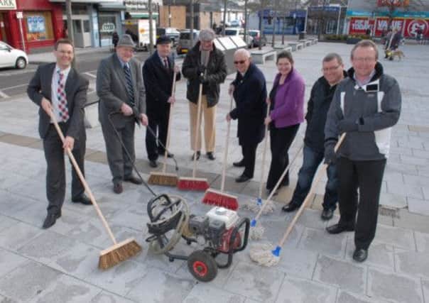 Councillors, traders and officials pictured at Broadway after the town centre clean up. INLT 12-328-PR