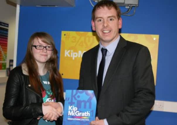 Megan Rafferty (competition winner) and Michael Rooney Centre Director of Kip McGrath Craigavon.