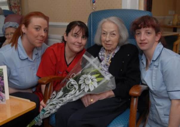 Marion Mackie-McIntyre celebrates her 104th birthday at Nicholson House along with Michaela Oates, Caroline Hefferon, Activity Nurse, Laura Faughey. INUS1313-BIRTHDAY