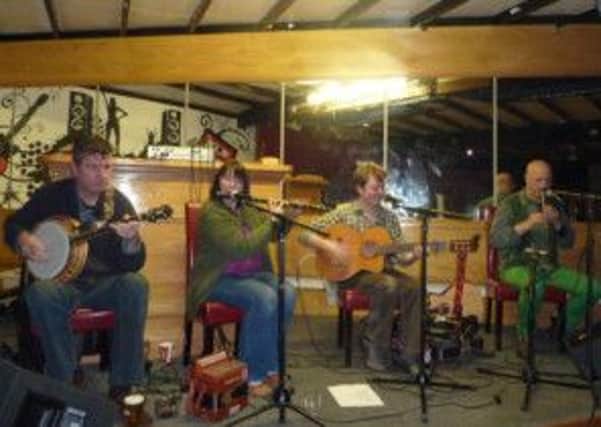 A traditional music session at the Glor Chosta Aontrom St Patrick's Day event in Carnlough. INLT 13-611-CON