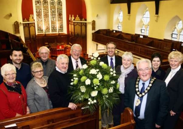 Rev. Daniel Kane of West Church is pictured along with Mayor of Ballymena, Ald. PJ McAvoy, Richard Haslam (floral art director), Janet Wilson (West Church) and representatives from the Hospice, Vis-art and West Church promoting the forthcoming West Church Flower Festival and Art Exhibition starting on Friday May 10. INBT13-237AC