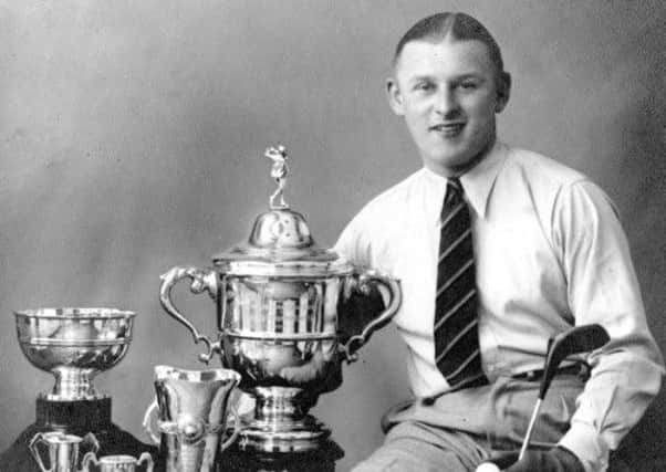 Ellis Williams with the Hilden and Musgrave Cups in 1941