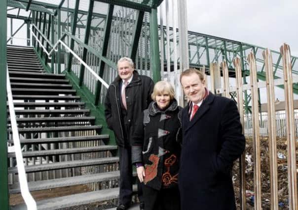 Councillors George Savage, Meta Crozier and Colin McCusker at the refurbished footvbridge at Brownlow Terrace. INLM13-201.