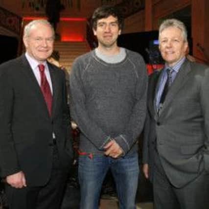 Snow Patrol frontman Gary Lighbody with Martin McGuinness and Peter Robinson. The bank have donated £20k to Altnaglevin.