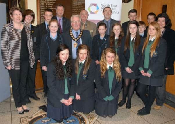 Ballymena Mayor PJ McAvoy joins pupils, teachers and organisers in St Louis School for the North East Peace III partnership exhibition. INBT 14-803H