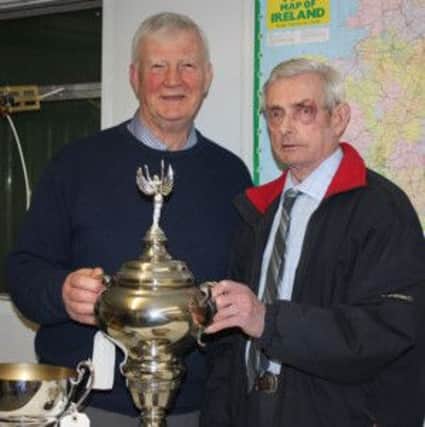 Cowan Balmer presents cup to Albert Young, after his big result from Penzance.