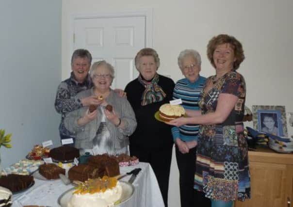 Jillian Pratchett pictured at her coffee morning with those who attended to help support the Lurgan Lights project.