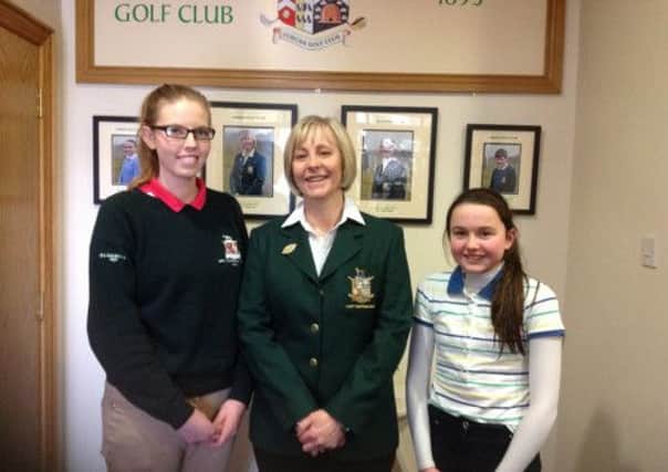 Anne Knox (lady captain, centre) with Maeve McKavanagh (left) and Cara Murphy following play across nine holes in the Adult/Girls competition.INLM14-153