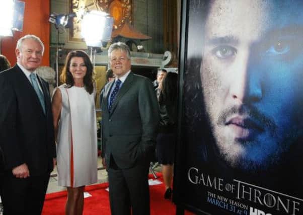 Minister Rt Hon Peter D Robinson MLA (right) and the deputy First Minister Martin McGuinness MLA (left) at the Chinese Theatre in Hollywood Boulevard with with Ballycastle Actress Michelle Fairley who plays Catelyn Starkin in Game of Thrones.