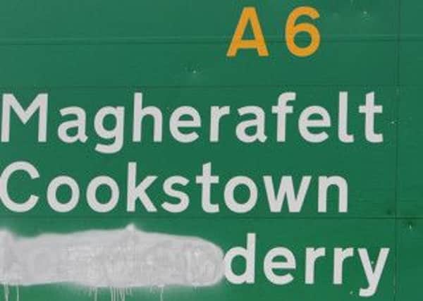 DUP MLA Gregory Campbell has raised the issue of vandalised road signs with DRD Minister Danny Kennedy.
