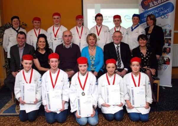 Pictured at the NWRC Junior Chef Graduation are: (front l-r) Sinead McLaughlin, Georgia Ritchie, Eimear McKeown, Claire Scott,  Zoe Peoples, (middle l-r) Martin Getty and Kerry Scullion Classic Wine Bar: Stanley and Marie Mathews Lime Tree Limavady; College Principal Seamus Murphy, Limavady Campus Manager, Norah Canny  (back l-r) Lecturer Barbara McGrath, Jill Diana Young, Dylan Kyle, Henrik McGill, Claire Feeney, Rachel Mackey, lecturer Bernie Peoples and Head of School Karen McLaughlin.