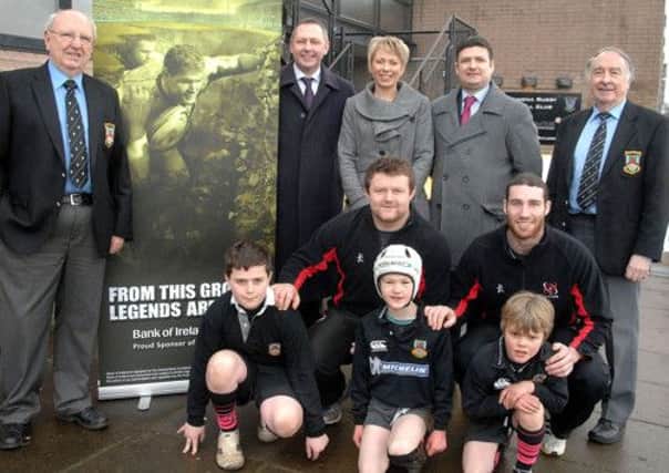 Ballymena RFC officials Bill Wallace, and Guy McCullough join First XV players Ricky Andrew and Andrew Warwick, members of the mini rugby section and Bank of Ireland officials Sean Sheehan, Jan Young and Shane McDonnell to launch the mini rugby festival at Eaton Park. INBT 12-951H