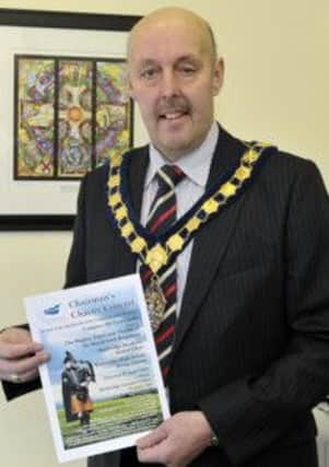 Banbridge District Council Chairman Cllr Junior McCrum gives a timely reminder of the Chairman's Charity Concert in Banbridge Leisure Centre on 27th April in aid of the Mandeville Unit, Craigavon Area Hospital  © Edward Byrne Photography INBL14-208EB
