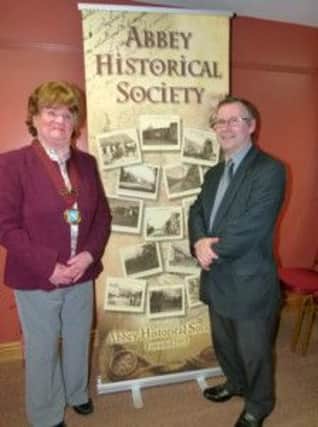 Author and historian Dr David Hume MBE was guest speaker at the recent meeting of the Abbey Historical Society. Dr Hume gave an interesting talk on the Poets of South Antrim to the group. He is pictured here with Vikki Dundas chairman of the Abbey Historical Society. INNT 13-627