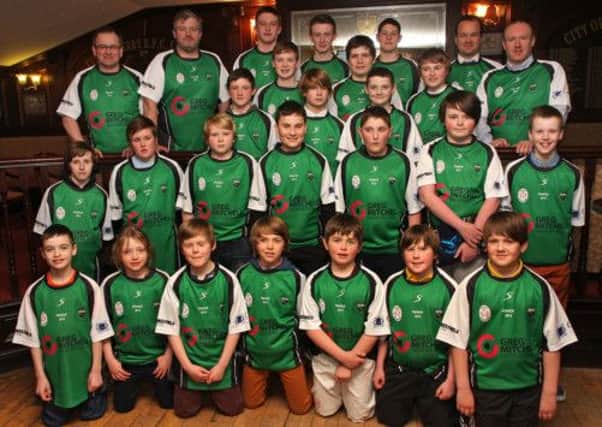 Members of City of Derry RFC mini and youth 71 strong squad of players, who recently travelled to France, pictured with their sponsors from Moores Fuels, Curtis Opticians and Greg Mitchell Motors Ltd. INLS1314-512MT