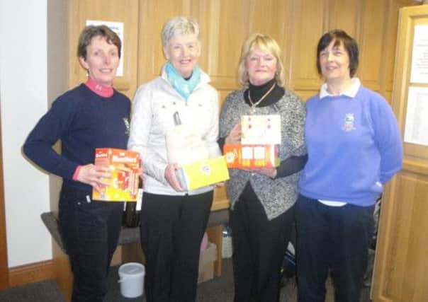 Easter Competition Prize Winners, from left to right Anne Hamilton (third), Jennifer Rainey (winner), Agnes McLaughlin (runner-up), Lady Captain Faye McGrotty.