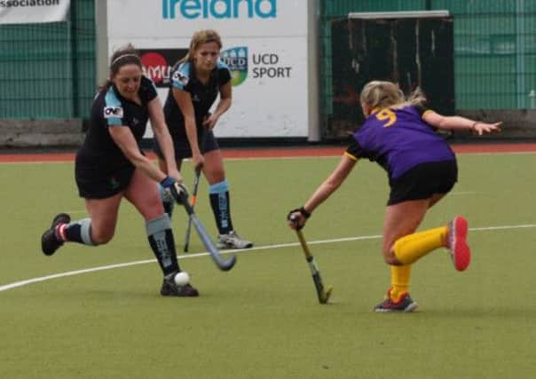 Lisnagarvey Second XI captain, Sara Allen, has a shot on goal during last Sunday's Irish Junior Cup final in Dublin.