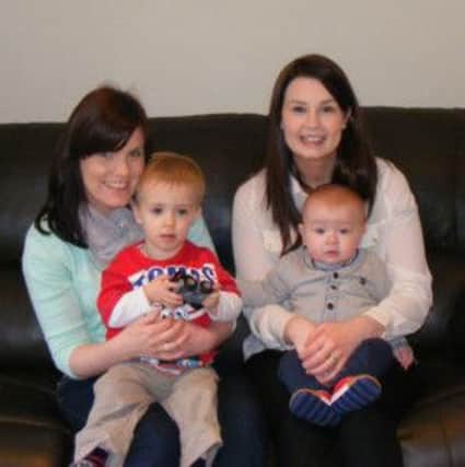 Claire O'Hanlon and Kerry McStravog with their sons, Luke and Brian Og. INTT1413-057X