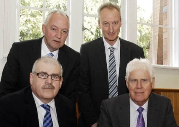 Back row from left, Trevor Robinson, Lurgan College Principal, and Simon Harper, Portadown College Principal. Front from left, Peter Aiken, chairman of Portadown College board of govenors, and Stanley Abraham, Chairman of Lurgan College board of govenors. INLM16-208.