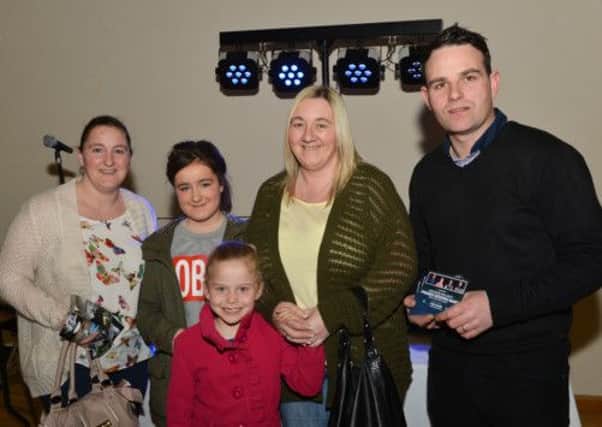 Singer Thomas Hamilton from the group Mojo is pictured with potential clients at the Newtownabbey Times Wedding Fair in the Courtyard Theatre. INNT 16-007-PSB