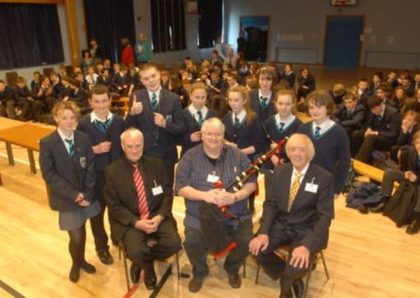 Some of the pupils from Beechlawn School who had a visit from members of the Northern Ireland Piping and Drumming School, funded by the Arts Council of Northern Ireland, with the prospect of setting up classes in piping and drumming. Included are Sam Bailie, Mervyn Hempton and Cecil Jones. INUS1613-BEECH