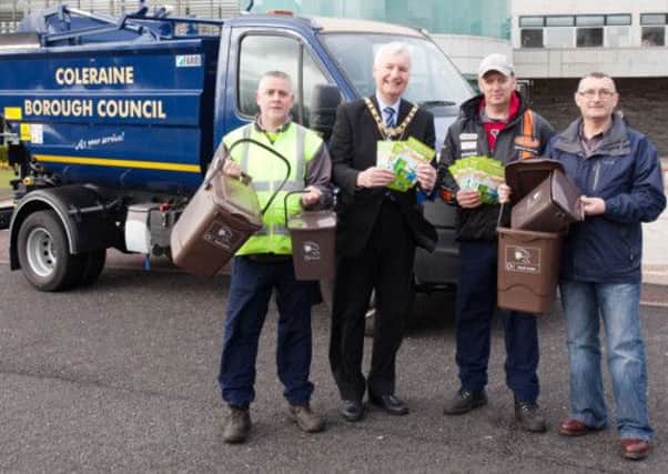 Adrian Millar and Alan McKeeman from Street Cleansing and Lawrence Daly, Refuse and Street Cleansing Supervisor, launch a new food refuse collection service at the Cloonavin on Thursday, with Councillor Sam Cole, Mayor of Coleraine. CR17-412PL
