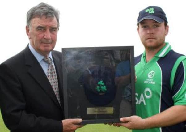Cricket Ireland President, Robin Walsh, pictured last year making a special presentation to Paul Stirling on his 100th cap. INLT 17-925-CON