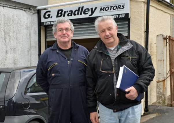 Ed Burns (right) Chairman of Glengormley Chamber of Trade with motor mechanic Gerry Bradley. INNT 17-025-PSB