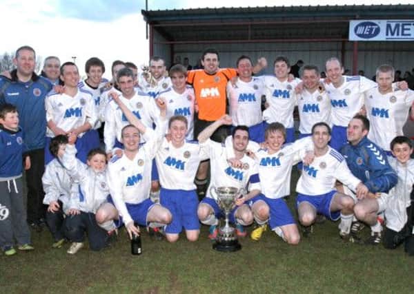 Lurgan BBOB celebrate after beating Tullyvallen 3 - 1 in the Harlequin Oil Tanks Foster Cup Final. RicPics. 19/4/13.