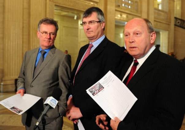 Pacemaker Press Belfast 23-04-2013:  MLAs, Mike Nesbit, Tom Elliott and Jim Allister, today briefed the press in the Great Hall, Stormont Belfast on the launch of a public petition opposing the building of the "Conflict Transformation Centre" on the Maze site in proximity to the prison buildings.
Picture By: Arthur Allison.