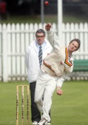 Craig Ervine bowling for Lisburn in his first spell with the club.