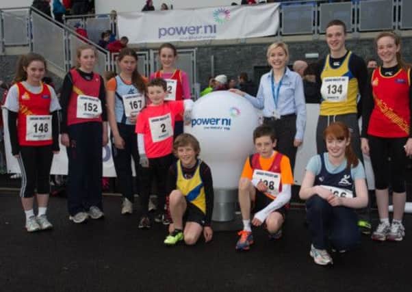 The competitors and Kirsty McAllister of Power NI at the first open meet at the new Mary Peters track. The Lagan Valley super 5 series is being sponsored by Power NI, who kindly subsided the entrance fee for all participants.