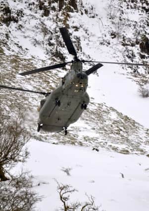 British Army  Chinnock helicopter drops in animal supplies to farms in Glenariff Co Antrim just after 1630hrs on the fifth day of the snoow crisis. PICTURE PADDY MCLAUGHLIN/KEVIN MCAULEY PHOTOGRAPHY MULTIMEDIA