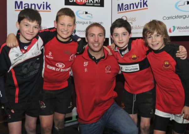 Carrickfergus P7 Mini rugby players were thrilled to get the chance to rub shoulders with Ulster star, Stephen Ferris. INLT 17-931-CON