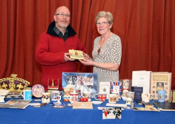 Rev. Derek Kerr, guest speaker from Randalstown who gave a talk about his collection of Royal Treasures, pictured with Joyce McLenaghan, Garvagh President and also Area President, during the Lower Bann Area W.I. Spring Area meeting held at Agherton Parish Centre on Thursday evening. CR18-413PL