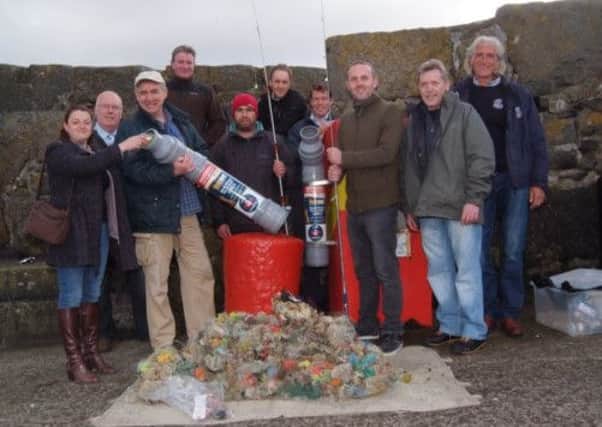 Line Out Waste Fishing Tackle
Pictured at the launch Emma Cunningham & Robert Keirle (Marine Cons Society) Jim Allen CBC  Keith Creelman Outdoor & Country Sports Joseph Local Angler  Mark Strong & Angus Barry CBC  Richard Connor Causeway Lass Bill McCartney Flying Tackle Portrush  Crawford Rankin Portrush Sea Tours 
CR18 404 MP