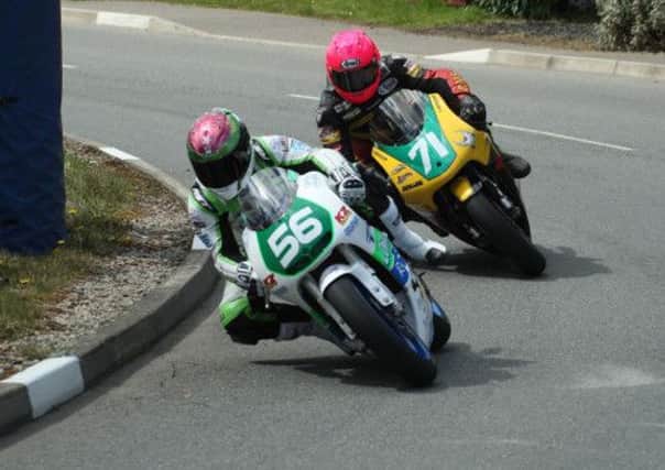 Ballymena's Sam Wilson ahead of Davy Morgan in the 250 race. Picture: Roy Adams.