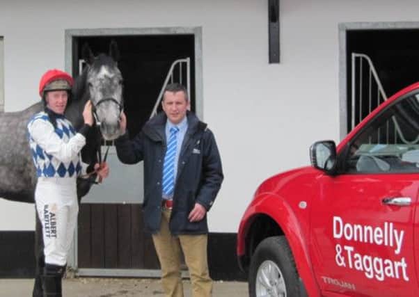 Jockey William Thompson with Joel Johnston of Donnelly & Taggart.