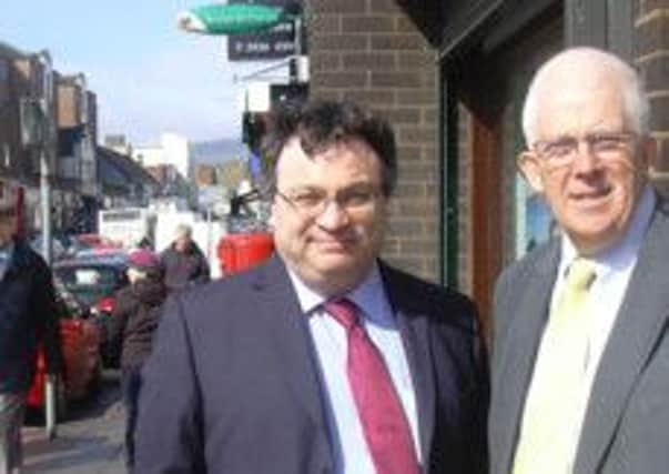 Employment and Learning Minister Dr Stephen Farry pictured in Larne town centre with Alliance MLA Stewart Dickson on Friday. INLT 18-692-CON