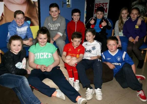 Members of Broughshane Youth Club who showed off their new cinema area at the recent parents night. INBT17-