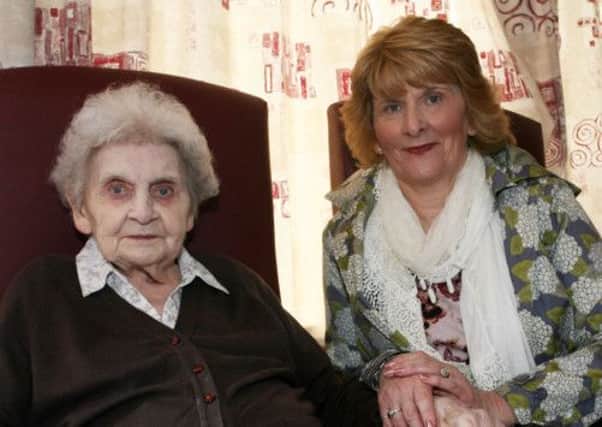 Joan McKibben along with her mother Jean Waring (93). INBT18-214AC